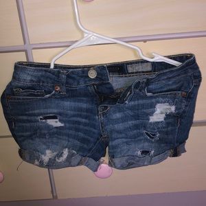 Ripped denim blue shorts